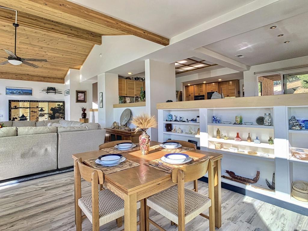 28743 Lebanon Road Pine Valley, CA 91962 - Photo 9 of 46 a dining room with stainless steel appliances kitchen island granite countertop furniture and a kitchen view