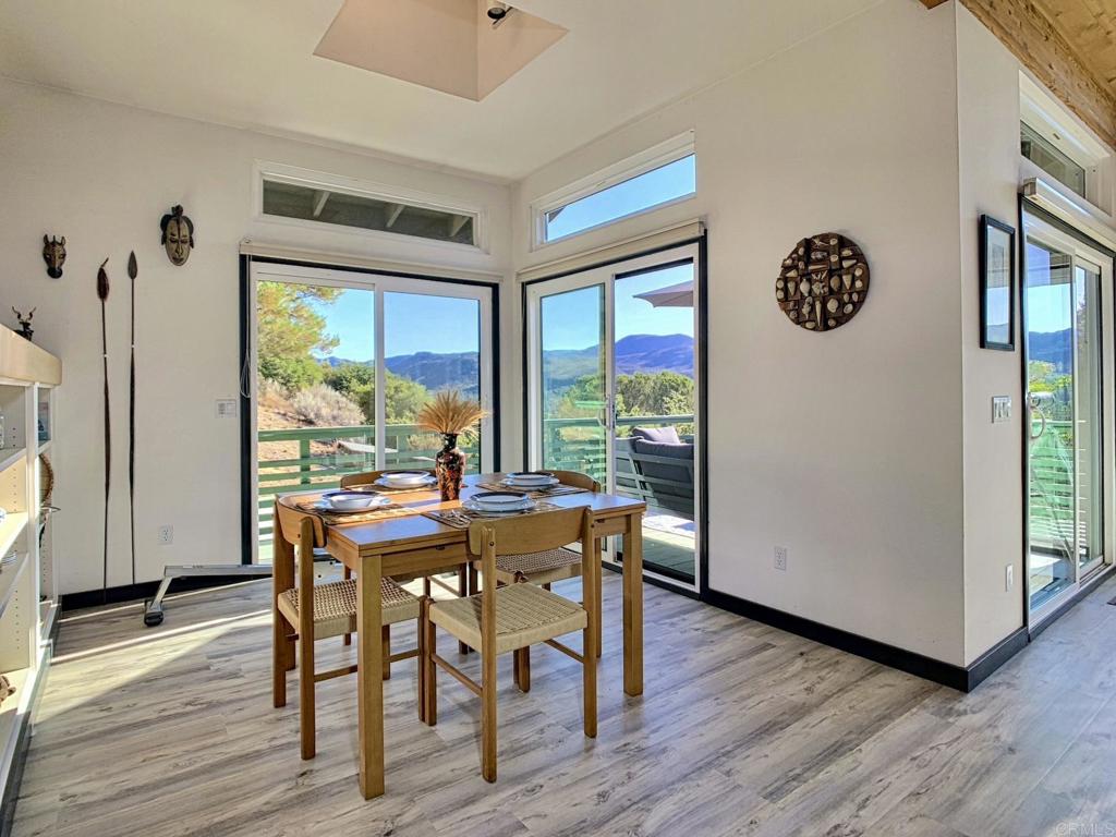 28743 Lebanon Road Pine Valley, CA 91962 - Photo 10 of 46 a view of a dining room with furniture window and wooden floor