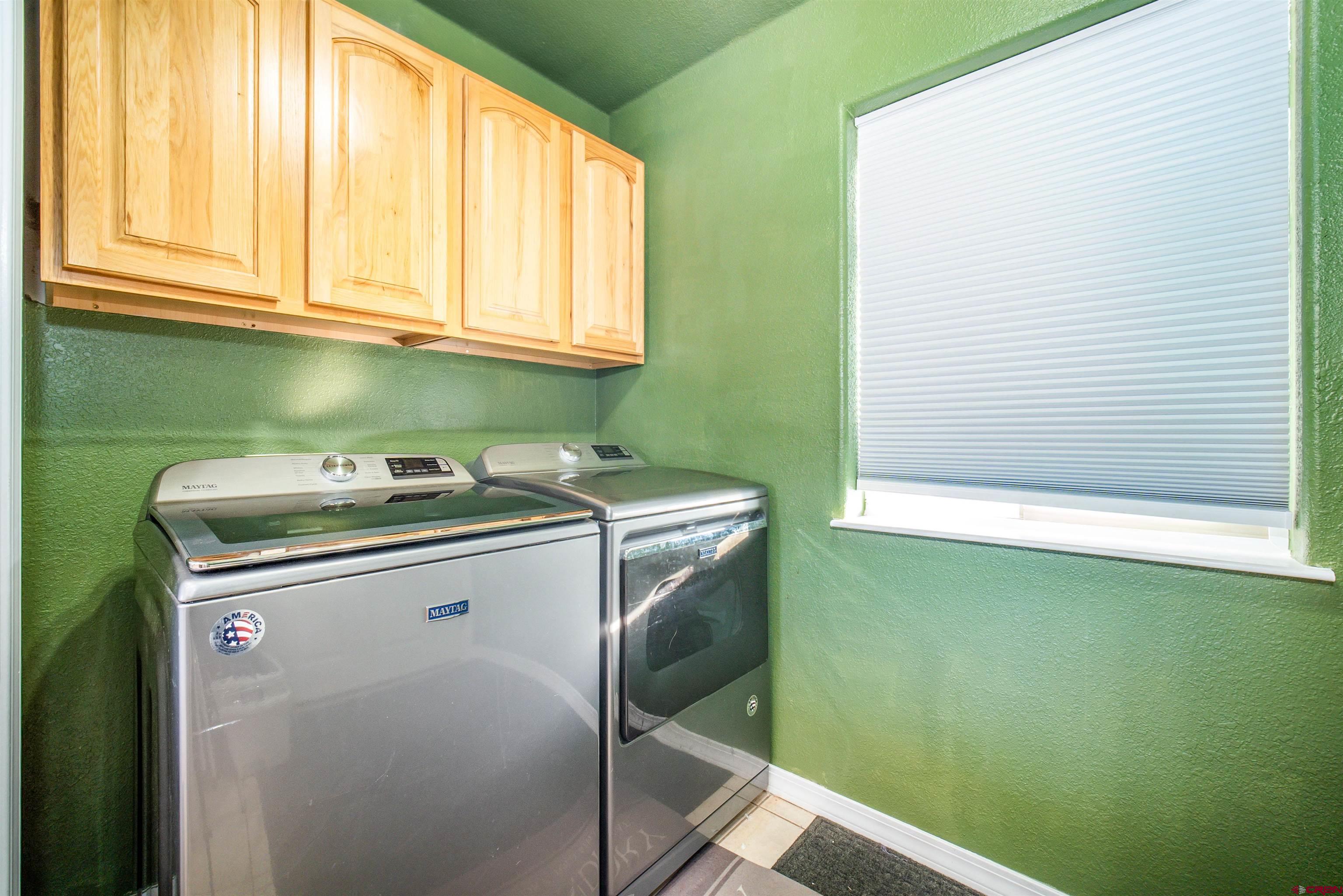 111 Meadowbrook Drive Bayfield, CO 81122 - Photo 17 of 30 a utility room with dryer and washer
