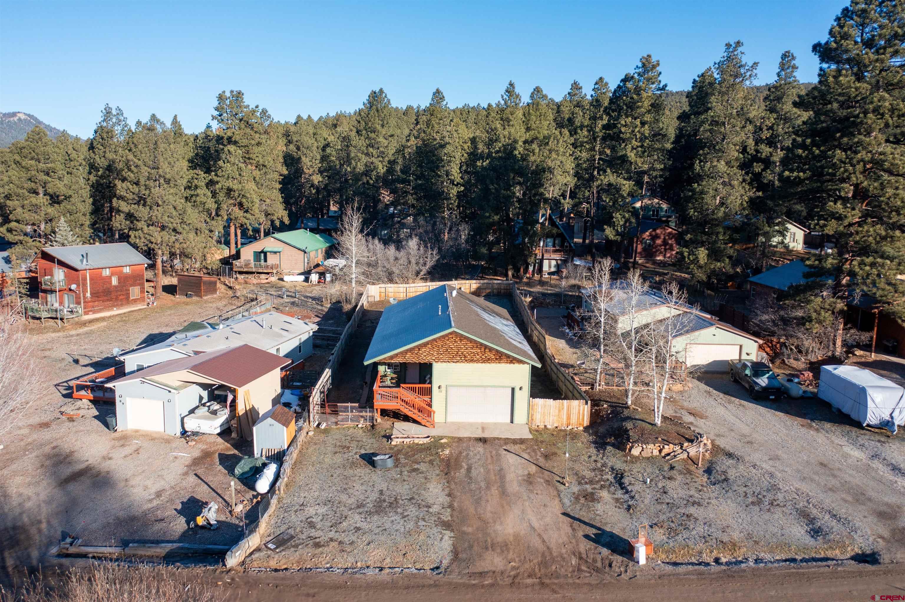 111 Meadowbrook Drive Bayfield, CO 81122 - Photo 24 of 30 a view of a house with a yard