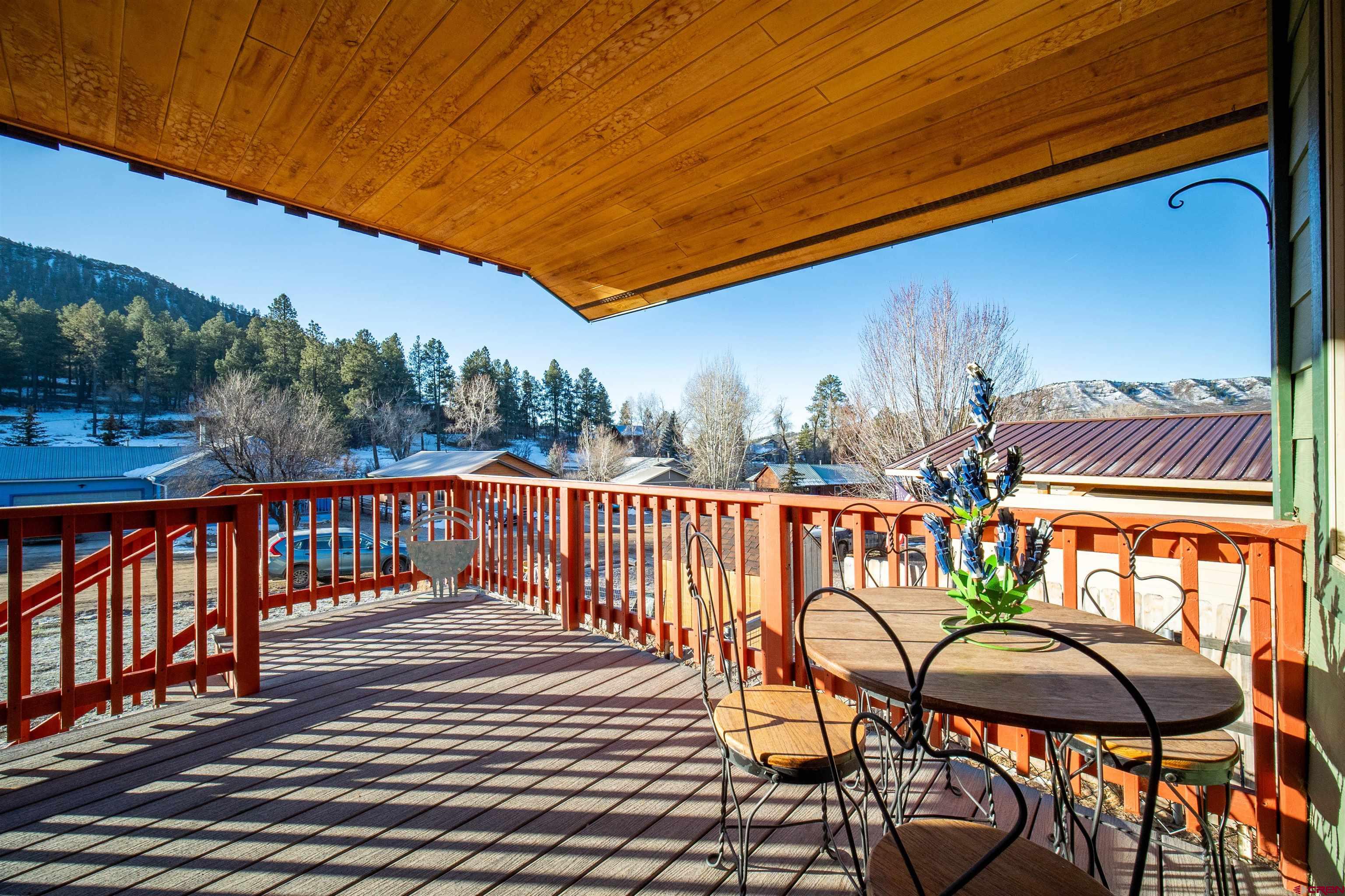 111 Meadowbrook Drive Bayfield, CO 81122 - Photo 26 of 30 a balcony with table and chairs