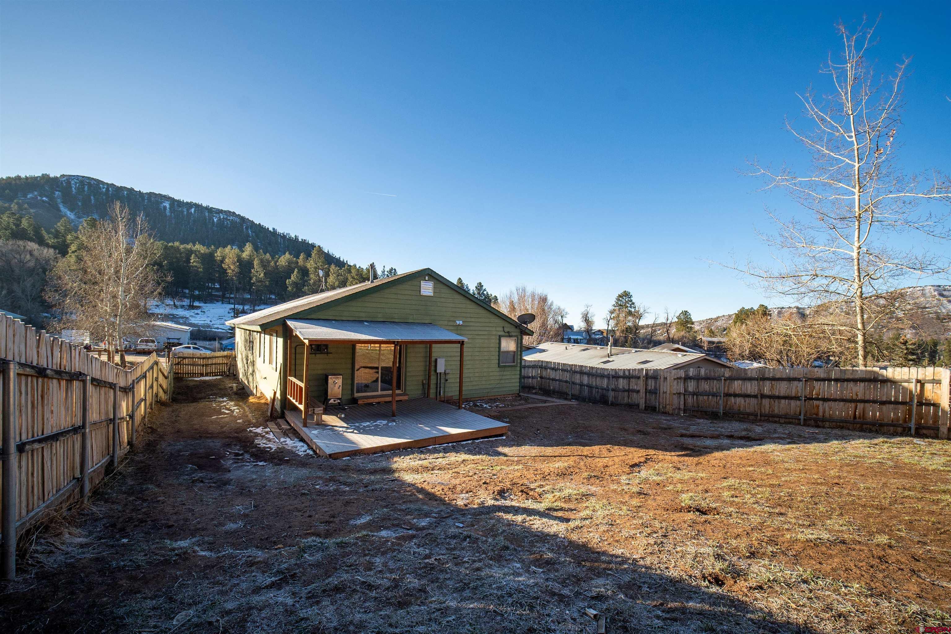 111 Meadowbrook Drive Bayfield, CO 81122 - Photo 30 of 30 a view of a house with a yard