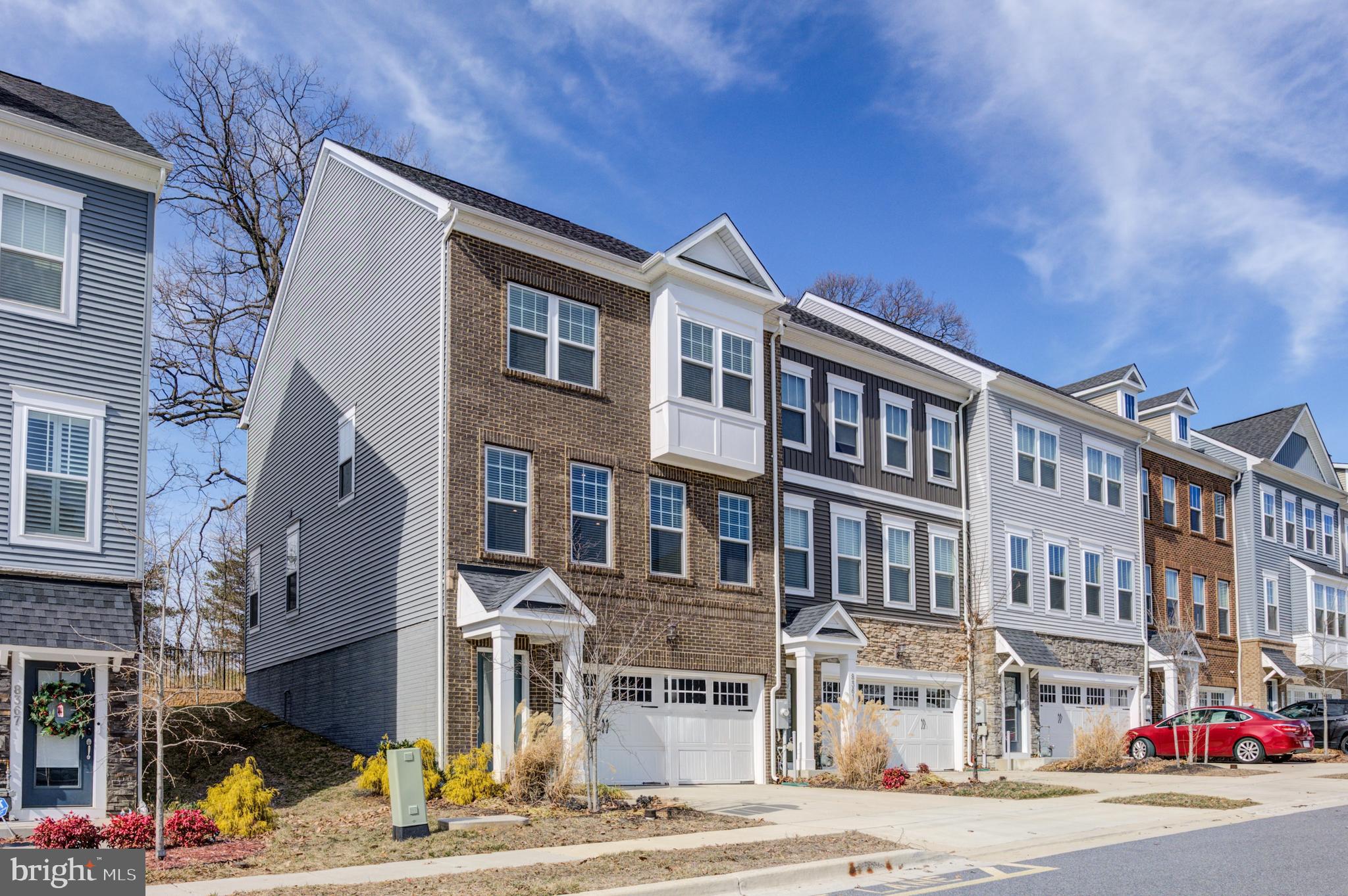 8363 Meadowood Drive Hanover, MD 21076 - Photo 1 of 39 a front view of a building with street view