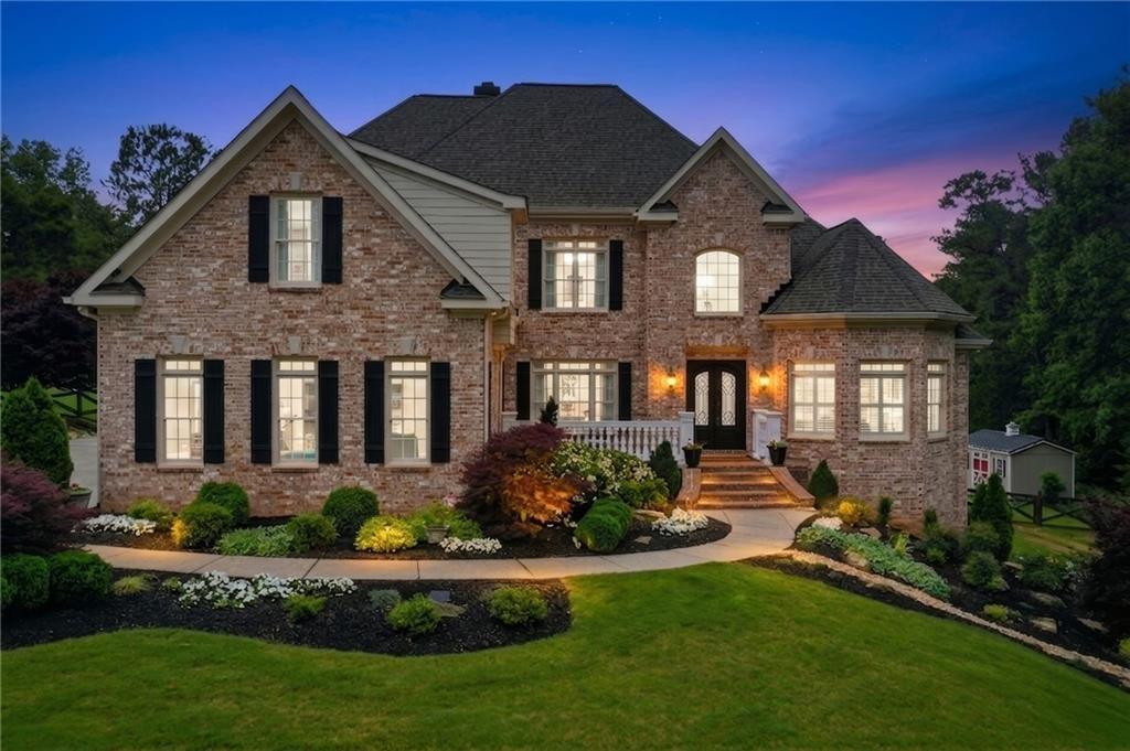 2950 Callie Still Road Lawrenceville, GA 30045 - Photo 2 of 77 a front view of a house with a yard