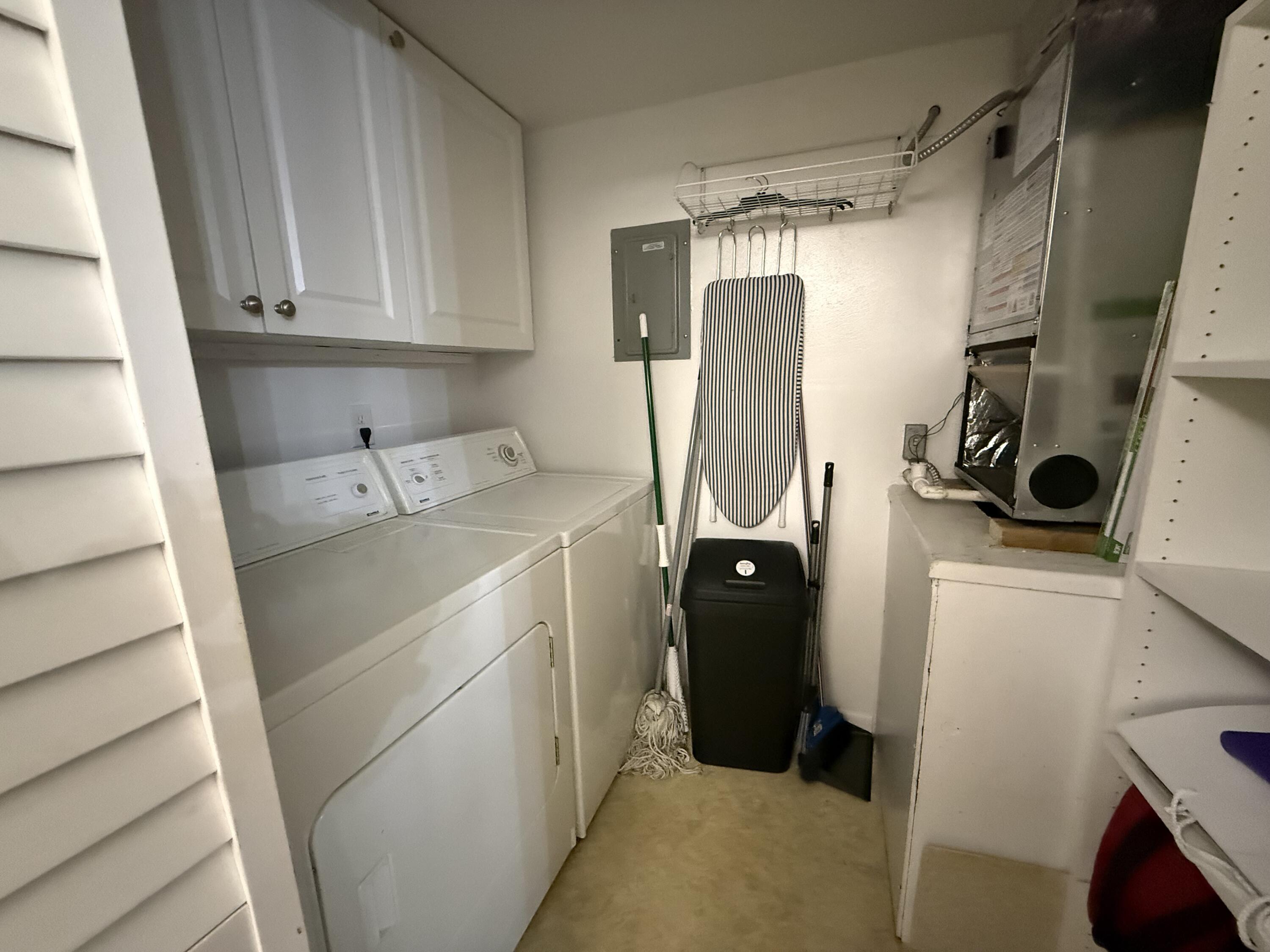 301 Pine Ridge Circle, Unit B1 Greenacres, FL 33463 - Photo 7 of 12 a room with storage and utility