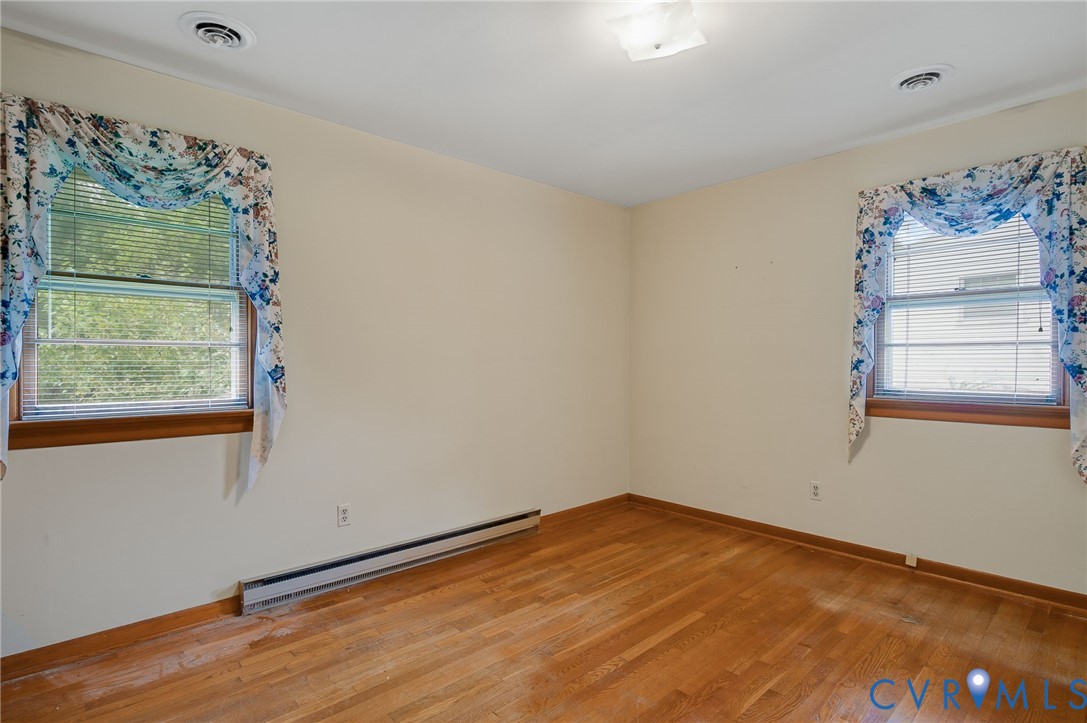 6450 Holborn Road Richmond, VA 23224 - Photo 17 of 20 Unfurnished room featuring a baseboard radiator an