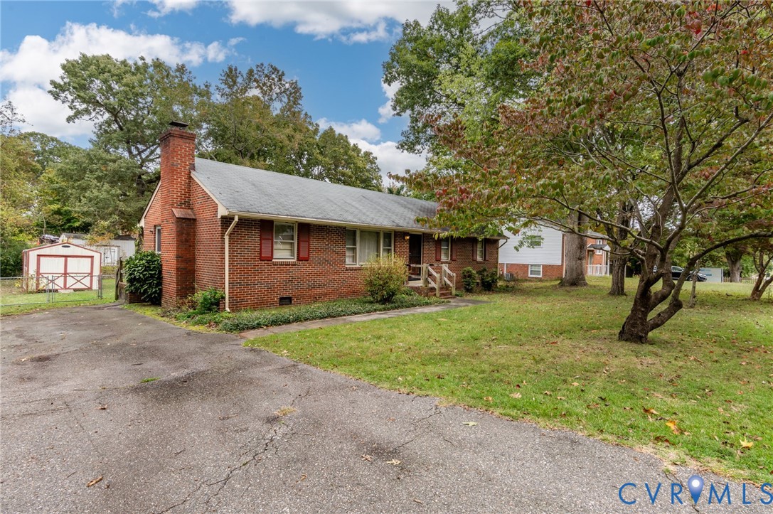 6450 Holborn Road Richmond, VA 23224 - Photo 2 of 20 Ranch-style home featuring a front yard, crawl spa