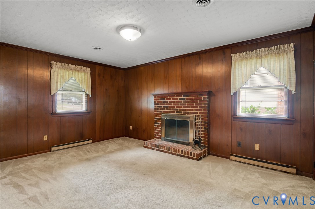 6450 Holborn Road Richmond, VA 23224 - Photo 8 of 20 Unfurnished living room featuring light colored ca