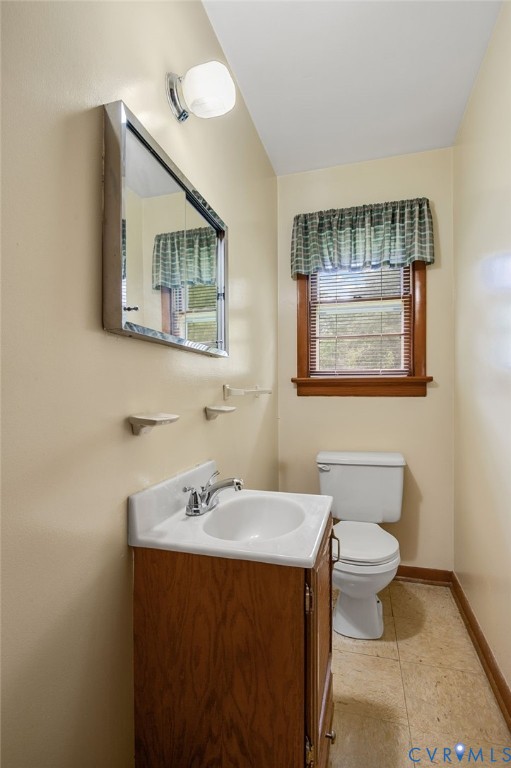 6450 Holborn Road Richmond, VA 23224 - Photo 10 of 20 Bathroom featuring vanity and light tile patterned