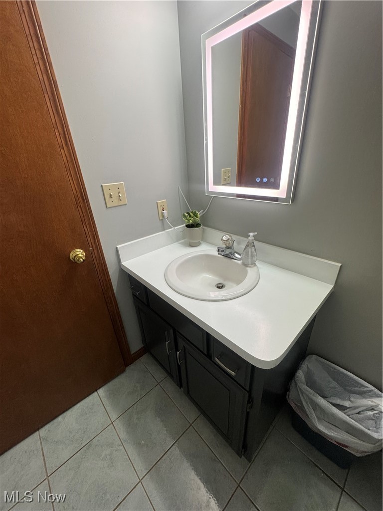 3530 State Road Medina, OH 44256 - Photo 19 of 47 Bathroom featuring tile patterned flooring and vanity