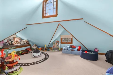 a room with toys and white walls