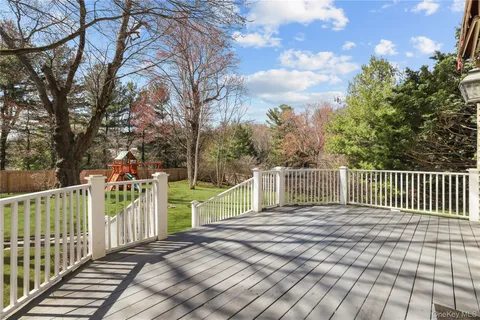 a balcony with a yard