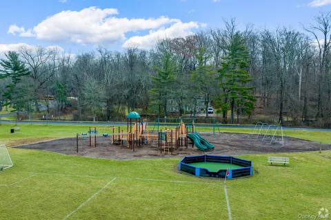 a park view with a sitting space and garden