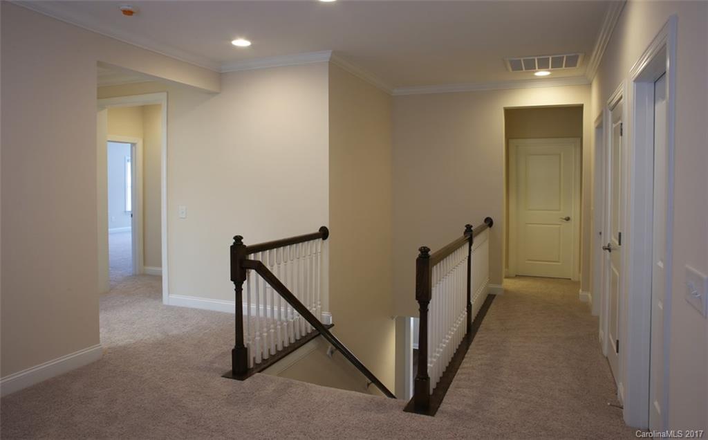 980 Emory Lane, Unit 112 Fort Mill, SC 29708 - Photo 16 of 23 a view of hallway with stairs