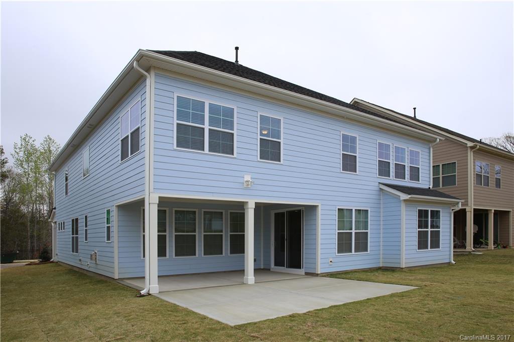 980 Emory Lane, Unit 112 Fort Mill, SC 29708 - Photo 7 of 23 a front view of a house with a yard