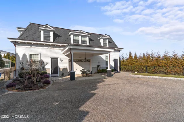 a front view of a house with a outdoor space