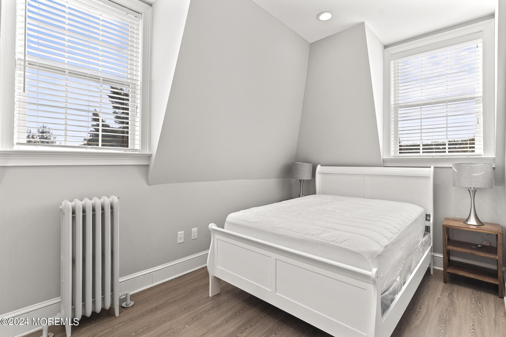 892 Elberon Avenue Long Branch, NJ 07740 - Photo 24 of 50 a bedroom with a bed and a window