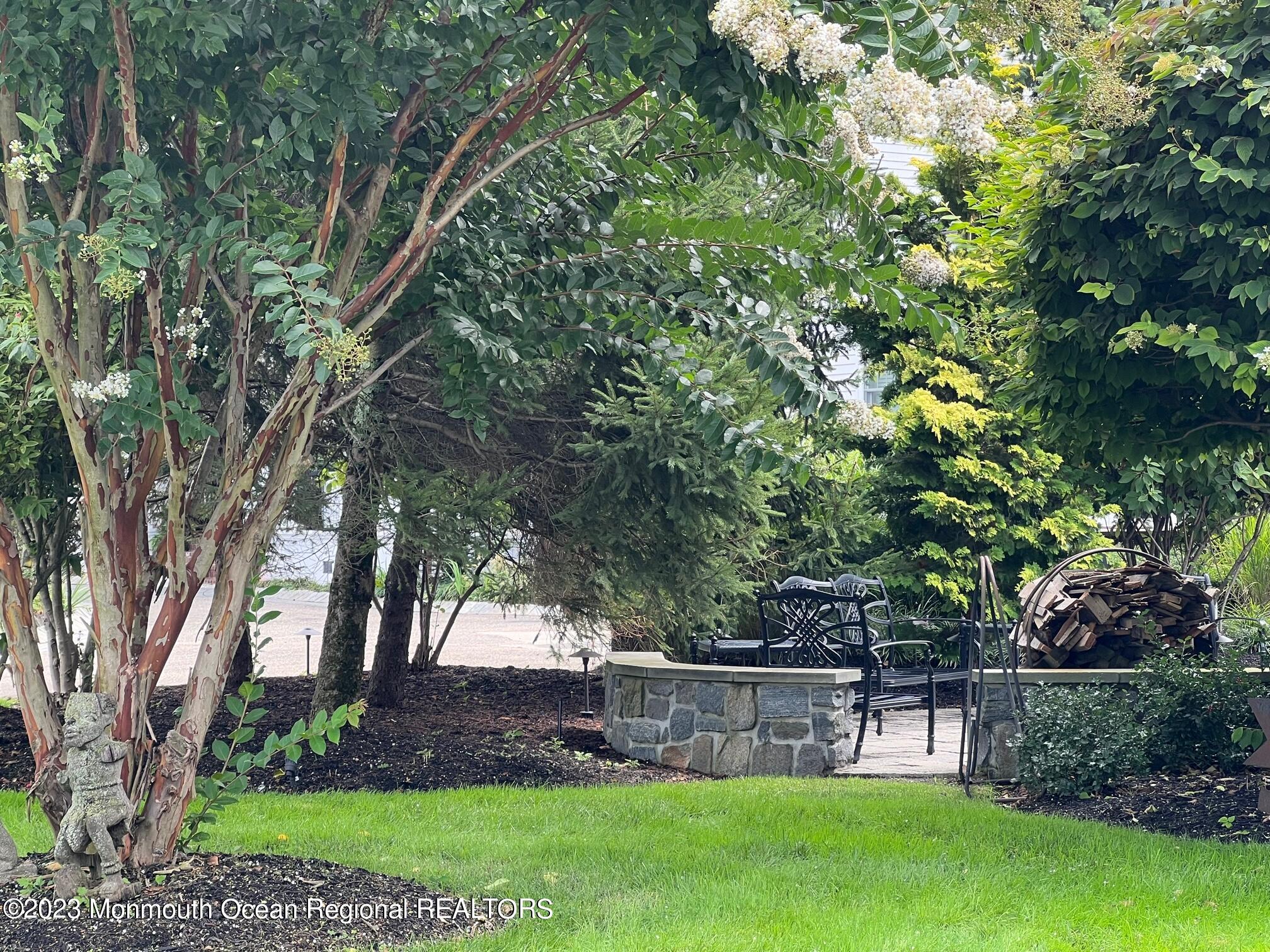 892 Elberon Avenue Long Branch, NJ 07740 - Photo 37 of 50 a view of a yard with a tree