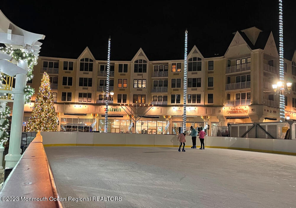 892 Elberon Avenue Long Branch, NJ 07740 - Photo 42 of 50 a group of people sitting in front of building