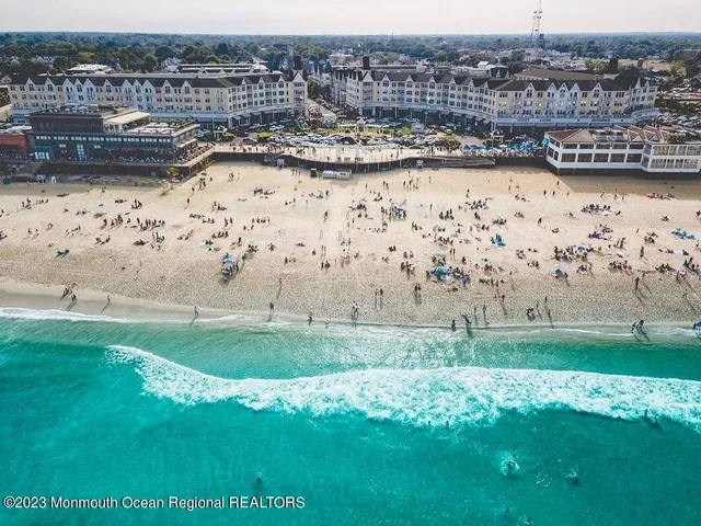 a group of people sitting in front of building