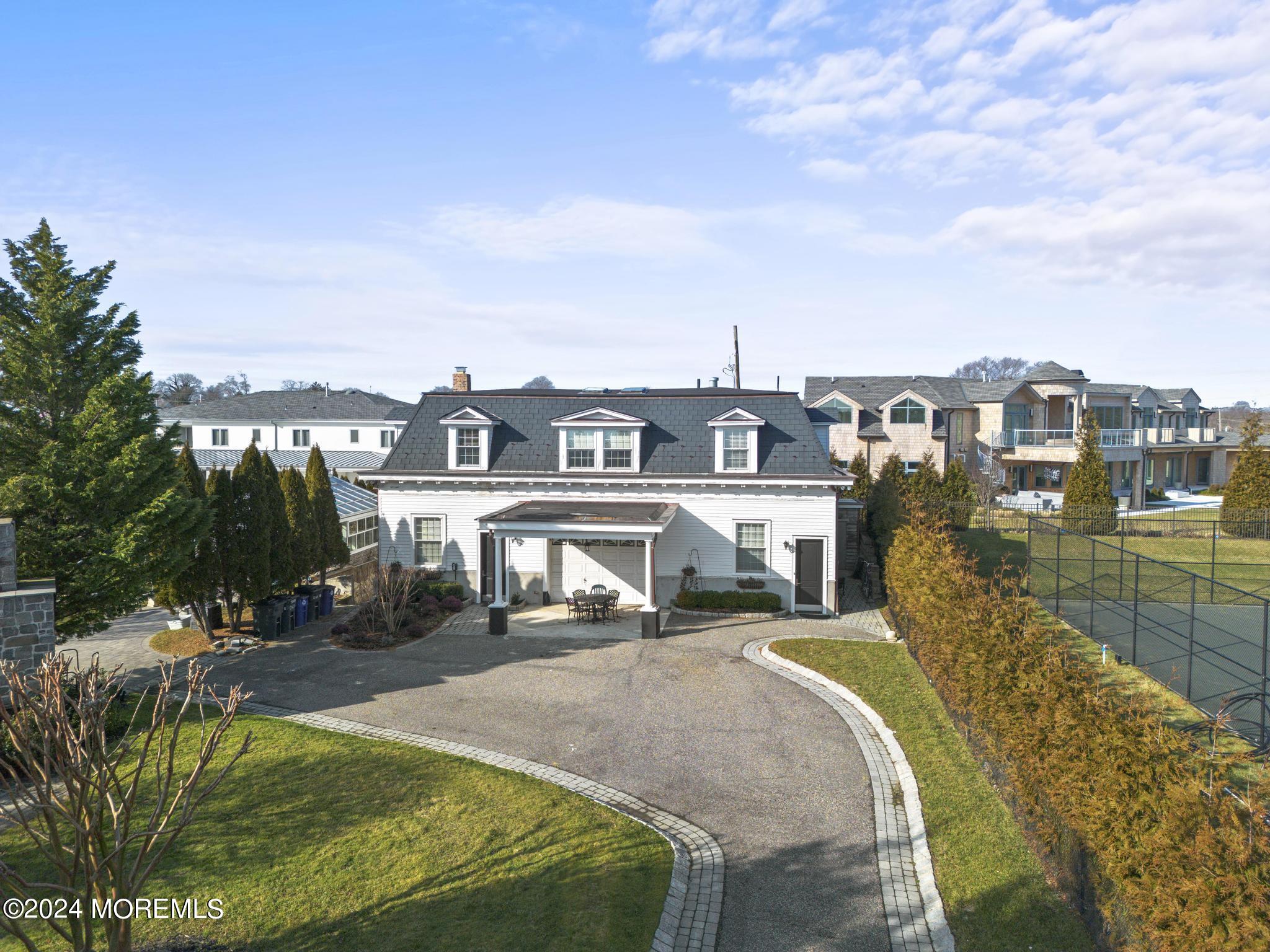 892 Elberon Avenue Long Branch, NJ 07740 - Photo 46 of 50 a view of residential houses with yard and car parked