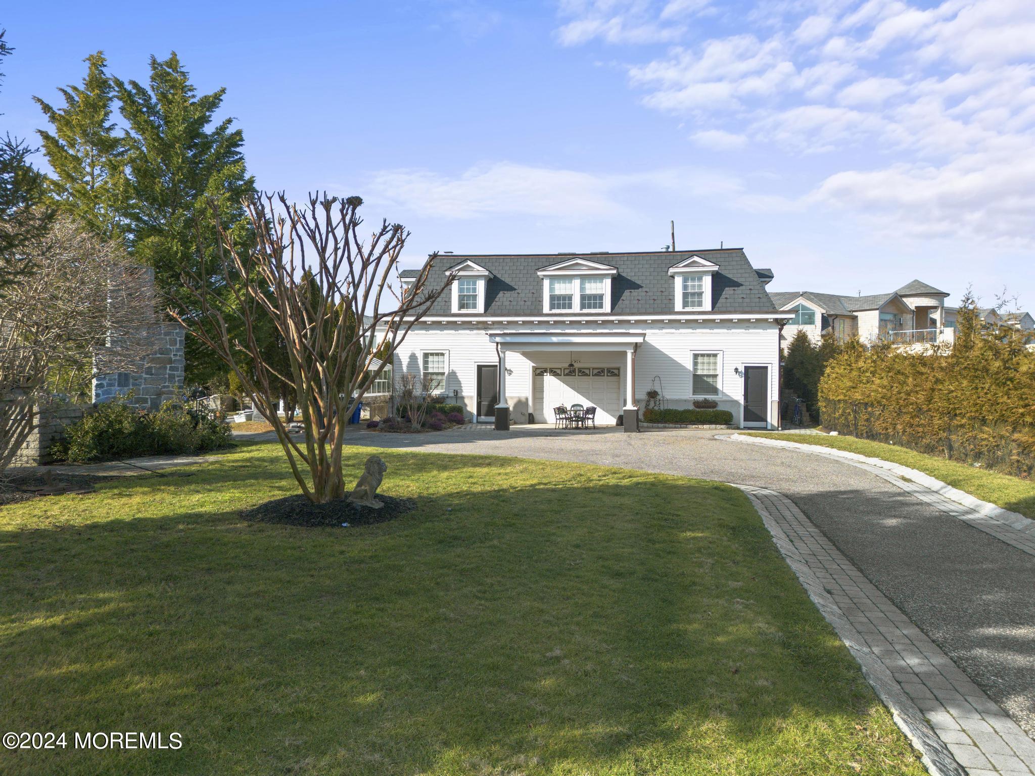 892 Elberon Avenue Long Branch, NJ 07740 - Photo 48 of 50 a front view of a house with a yard