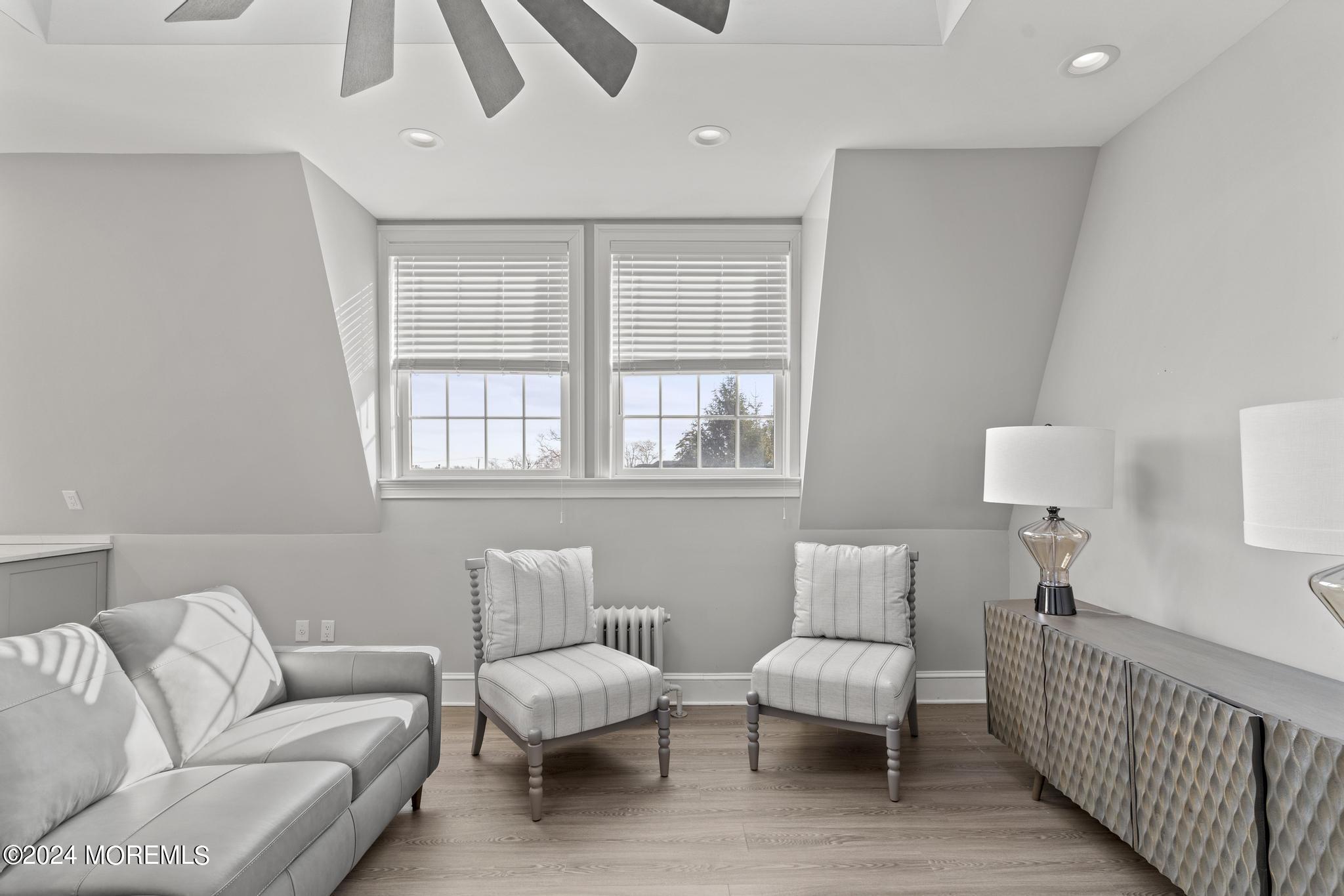 892 Elberon Avenue Long Branch, NJ 07740 - Photo 10 of 50 a living room with furniture and a window