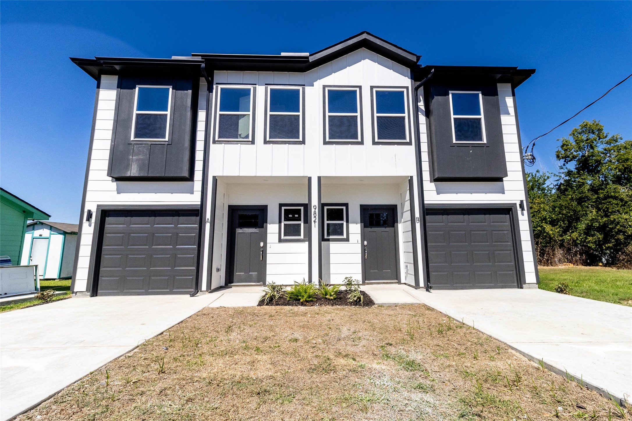 9821 Richcroft Street Houston, TX 77029 - Photo 2 of 15 a front view of a house with a yard
