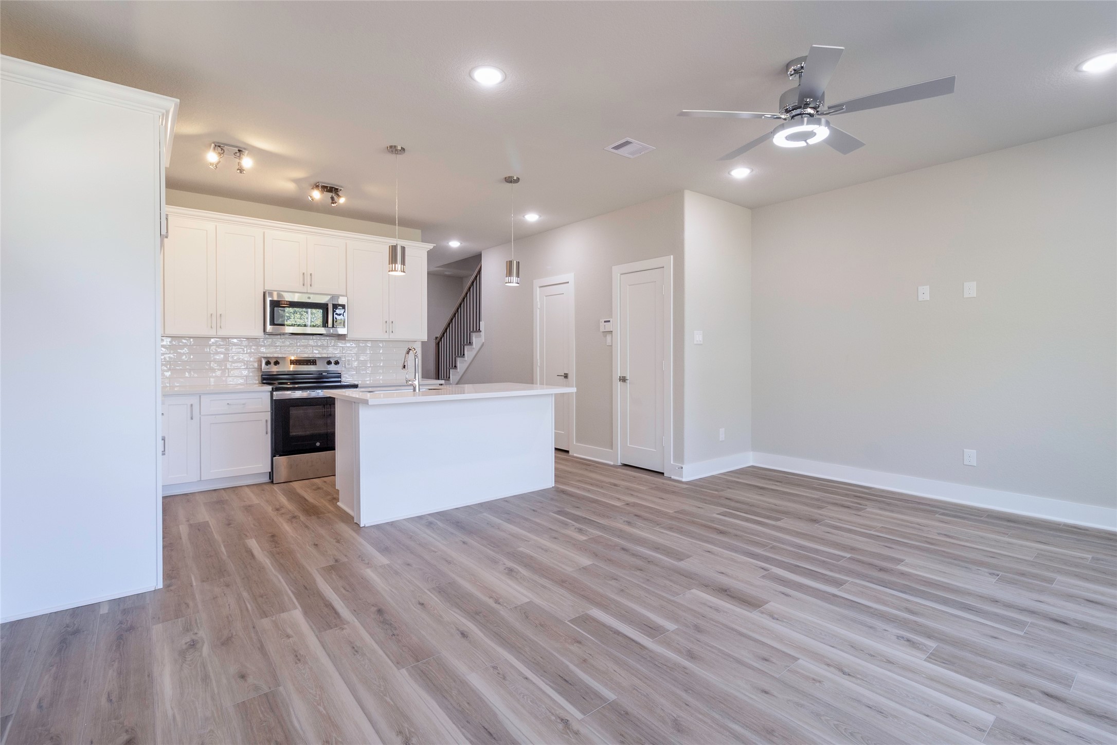 9821 Richcroft Street Houston, TX 77029 - Photo 8 of 15 a view of kitchen with cabinets and stainless steel appliances