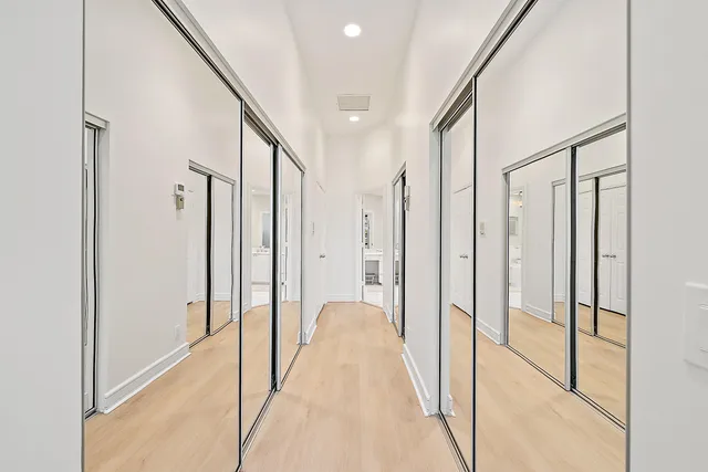a view of a bathroom with tub and shower