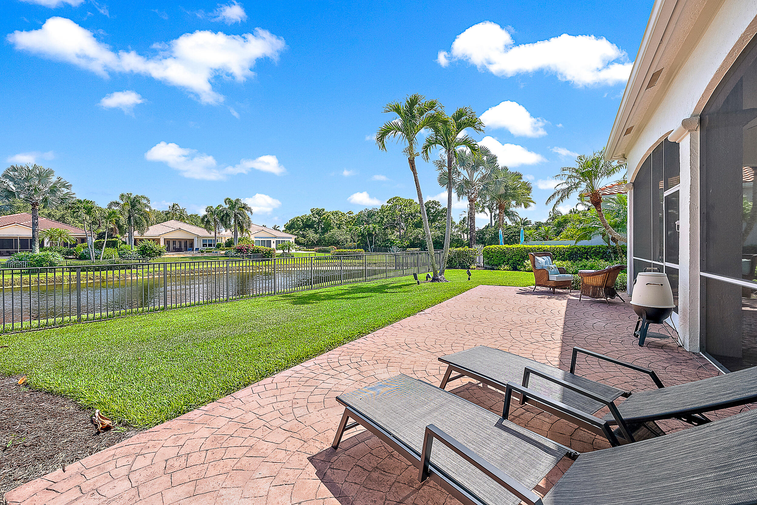 167 North Village Way Jupiter, FL 33458 - Photo 2 of 30 a view of a patio with a yard