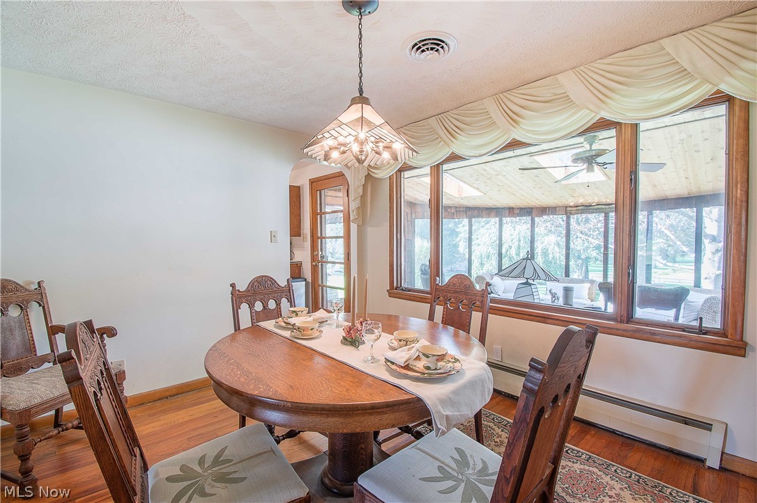 2128 Pressler Road Akron, OH 44312 - Photo 15 of 35 The dining room is spacious and has a beautiful view of the enclosed porch