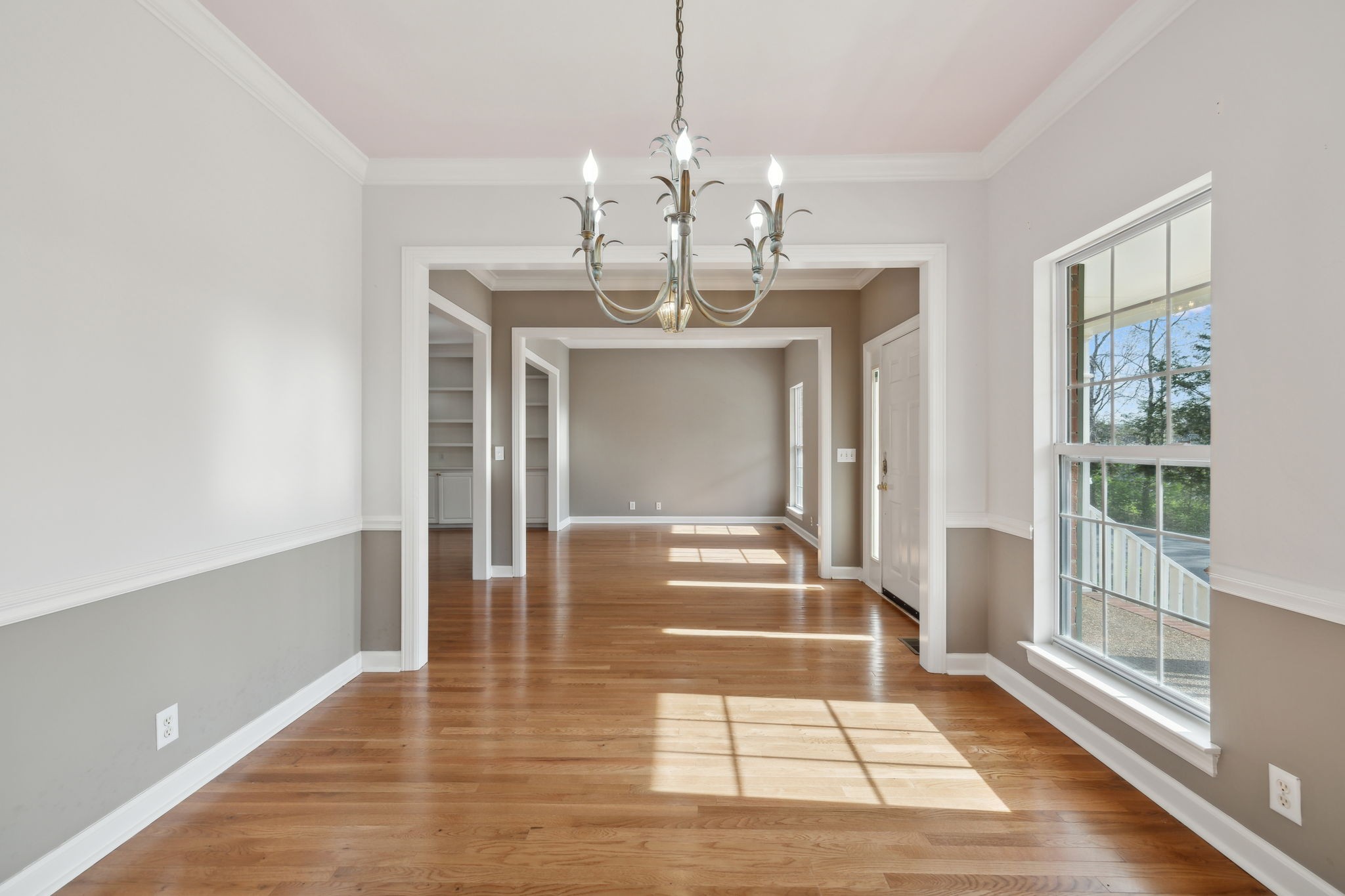 8012 Poplarwood Road Nashville, TN 37221 - Photo 1 of 32 a view of a hallway with a chandelier and livingroom view