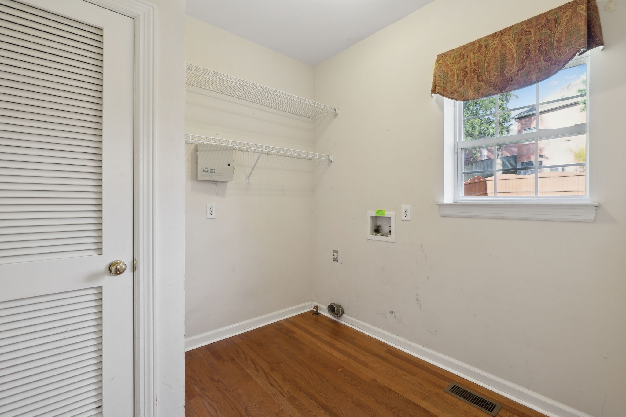 8012 Poplarwood Road Nashville, TN 37221 - Photo 16 of 32 a view of a small space with wooden floor and a window
