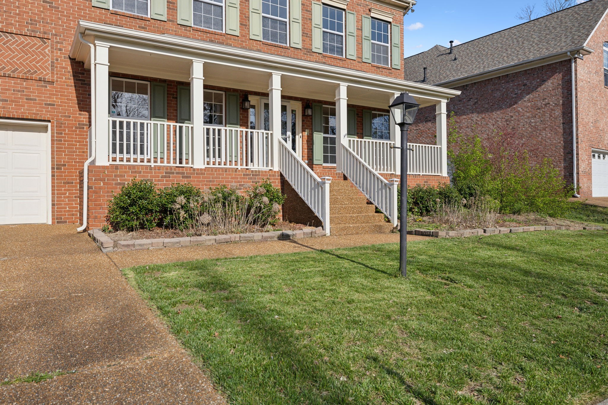 8012 Poplarwood Road Nashville, TN 37221 - Photo 2 of 32 a view of a house with a yard