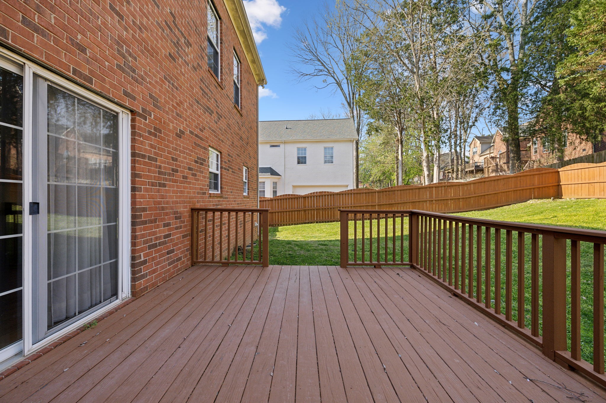 8012 Poplarwood Road Nashville, TN 37221 - Photo 30 of 32 a view of a wooden deck and a yard