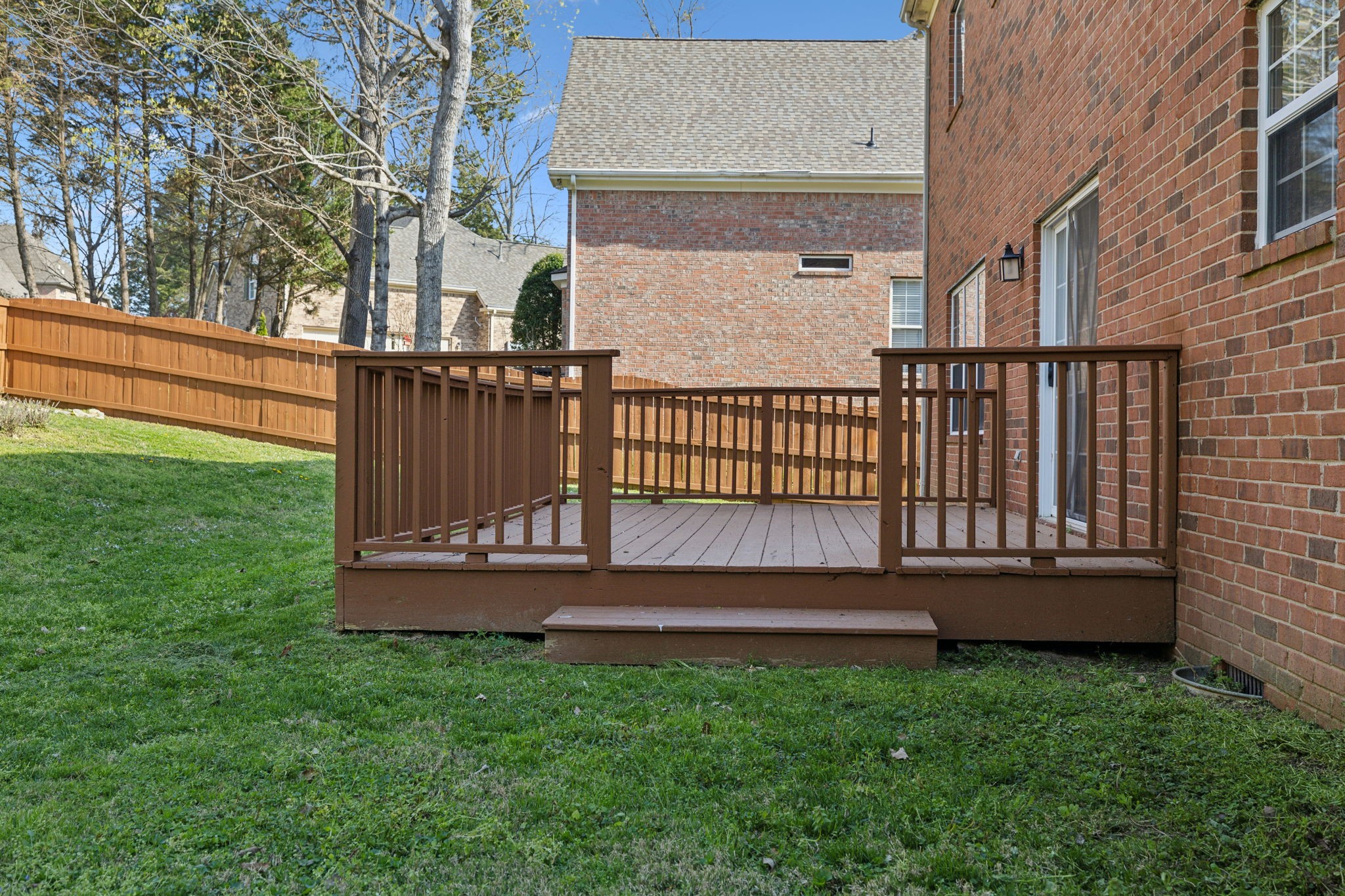 8012 Poplarwood Road Nashville, TN 37221 - Photo 31 of 32 front view of a house with a yard
