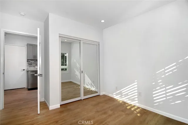 a bathroom with a sink a mirror and a shower