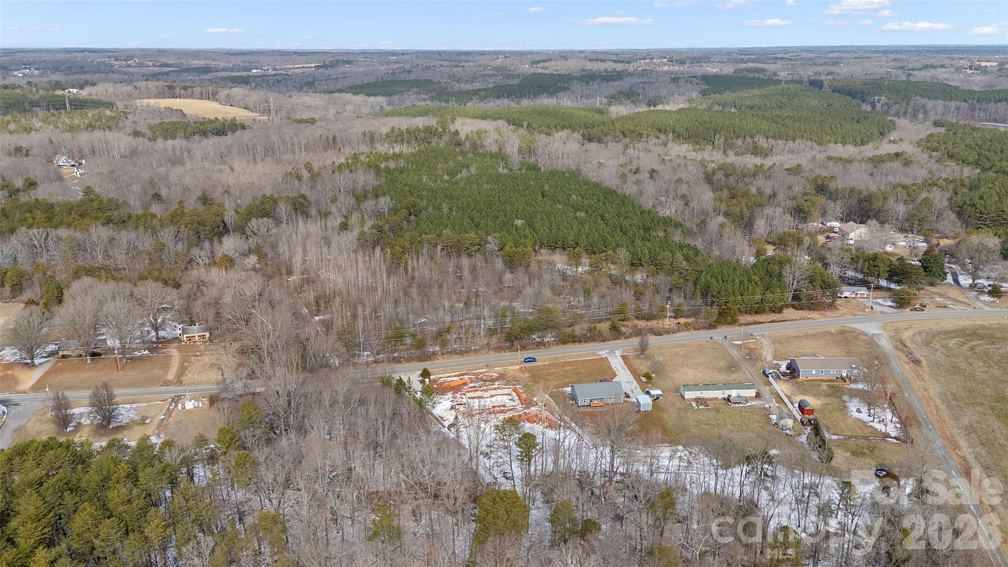 6399 Little Mountain Road, Unit 1 Sherrills Ford, NC 28673 - Photo 13 of 40 a view of a lake with mountains in the background