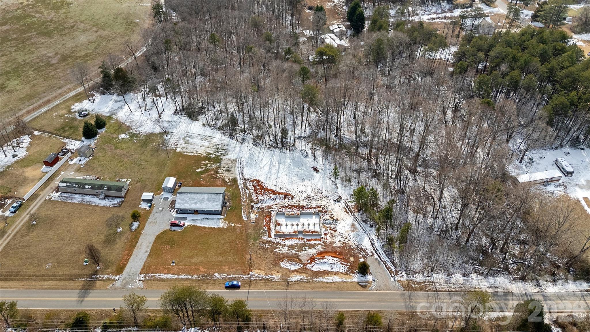 6399 Little Mountain Road, Unit 1 Sherrills Ford, NC 28673 - Photo 27 of 40 an aerial view of residential houses with outdoor space