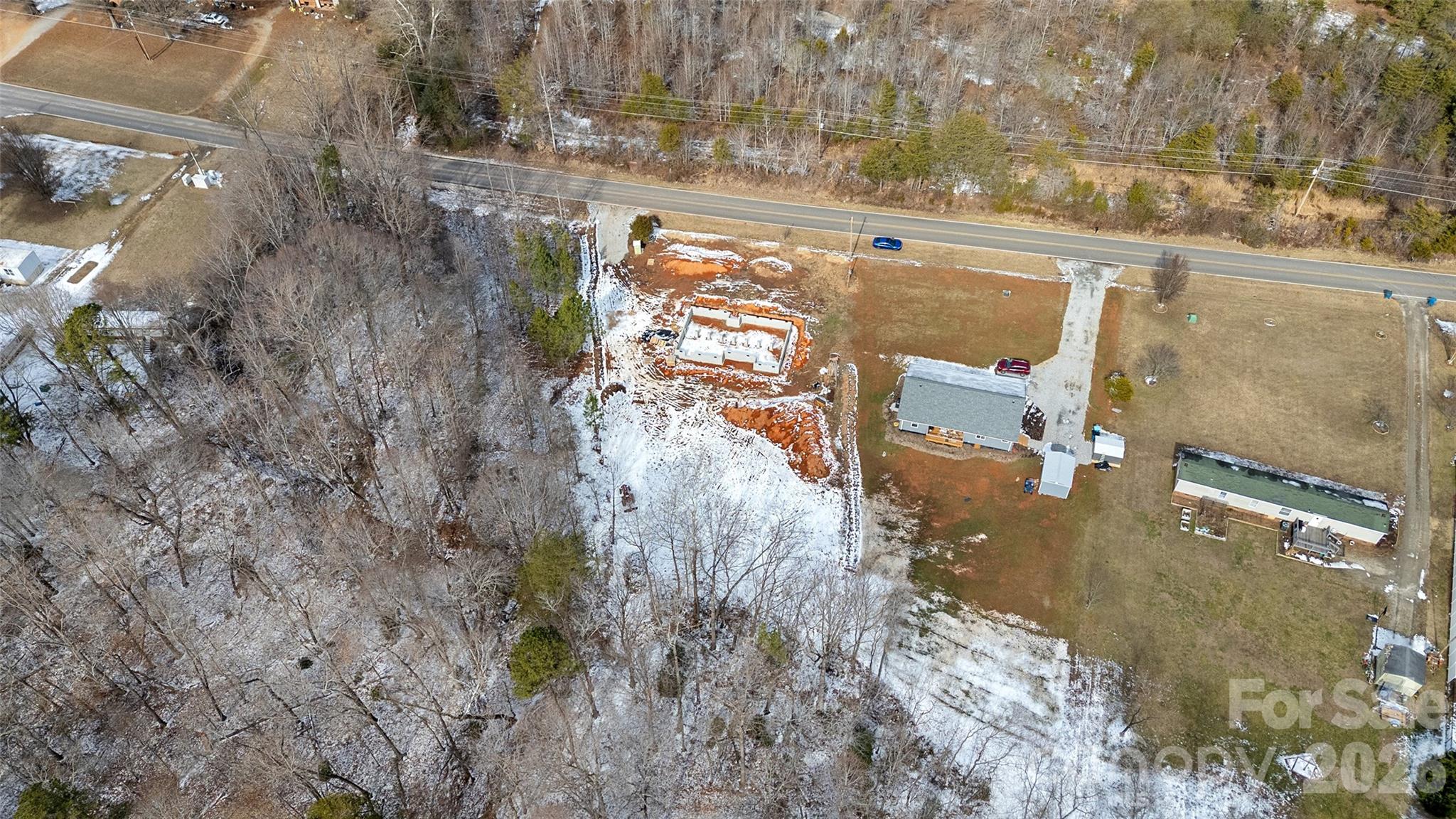 6399 Little Mountain Road, Unit 1 Sherrills Ford, NC 28673 - Photo 31 of 40 an aerial view of residential houses with outdoor space