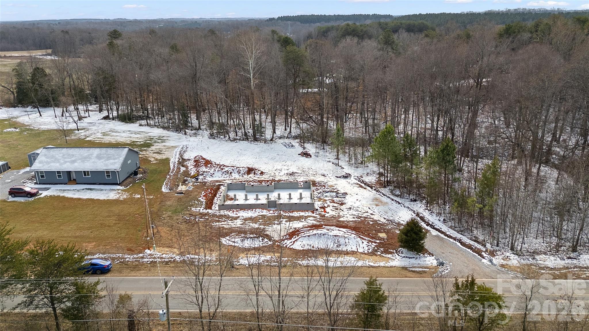 6399 Little Mountain Road, Unit 1 Sherrills Ford, NC 28673 - Photo 35 of 40 a view of a lake with a house