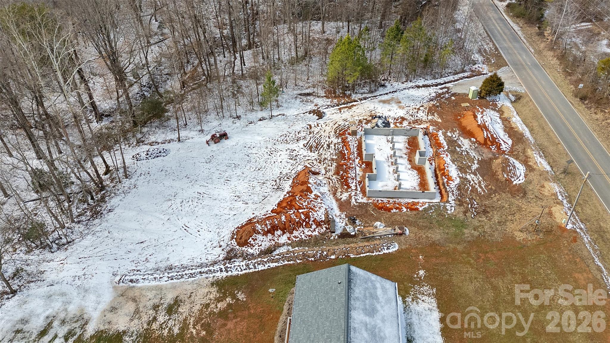 6399 Little Mountain Road, Unit 1 Sherrills Ford, NC 28673 - Photo 39 of 40 a view of roof with wooden fence
