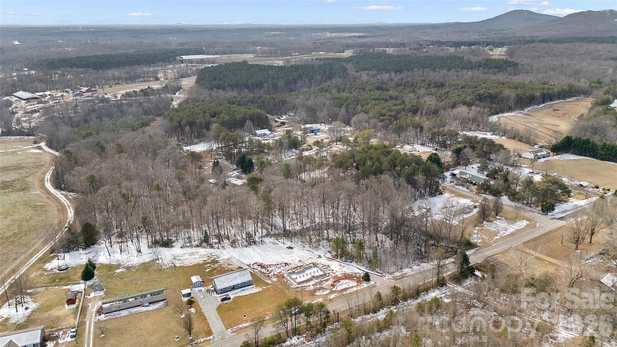6399 Little Mountain Road, Unit 1 Sherrills Ford, NC 28673 - Photo 5 of 40 a view of a town with mountains
