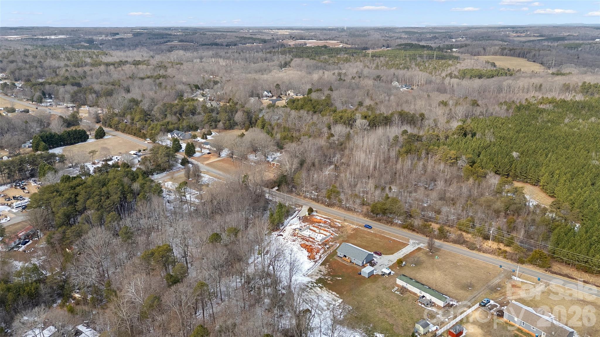 6399 Little Mountain Road, Unit 1 Sherrills Ford, NC 28673 - Photo 9 of 40 an aerial view of a house with a yard