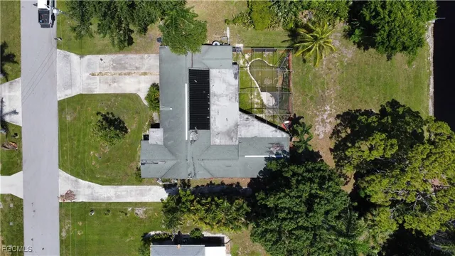 a view of a lake with houses in outdoor space