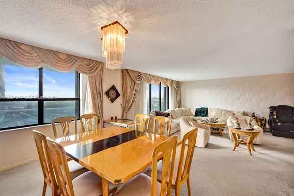 a view of a dining room with furniture