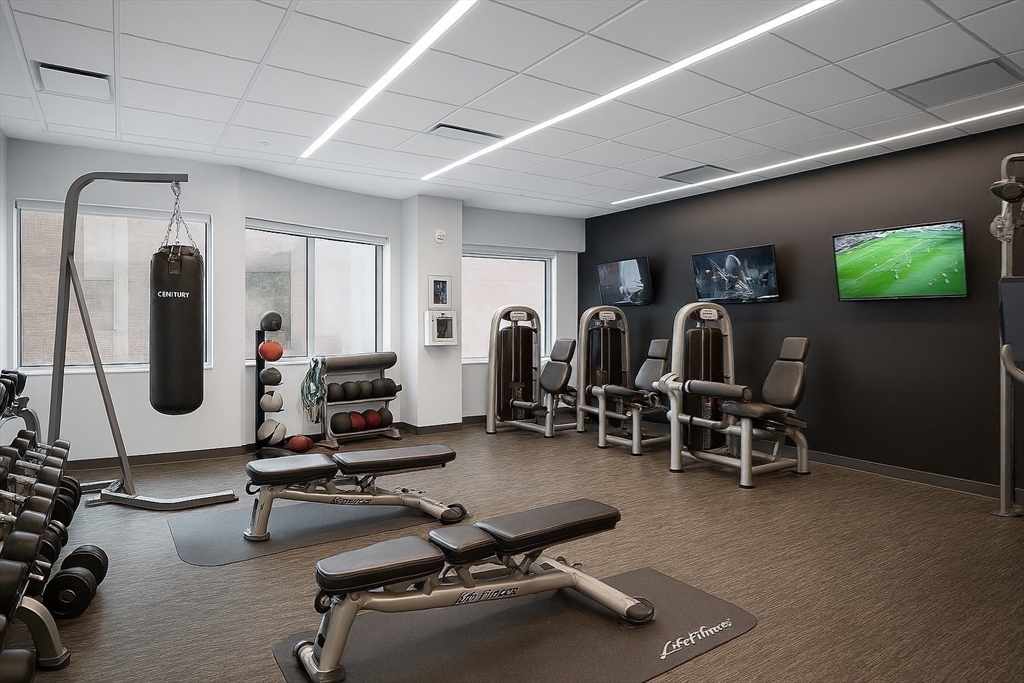 110 Stuart Street, Unit 16H Boston, MA 02116 - Photo 16 of 22 a view of a room with gym equipment