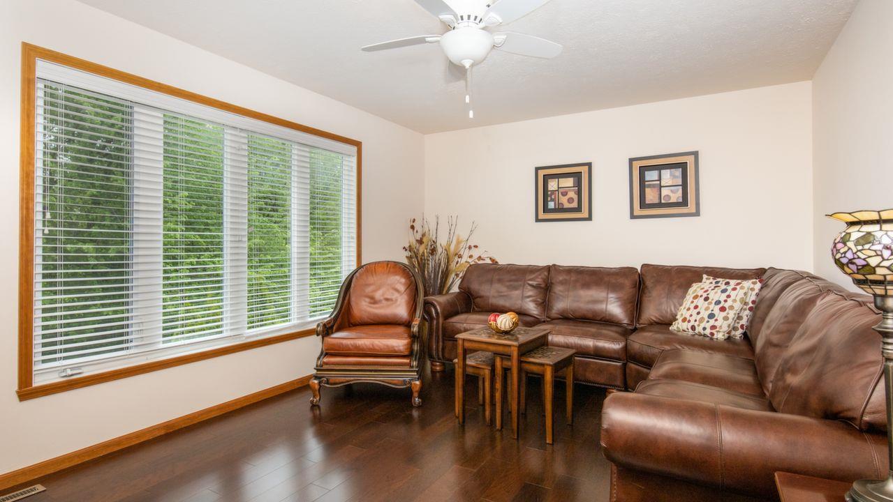 11105 Chicory Ridge Way Roscoe, IL 61073 - Photo 9 of 35 a living room with furniture and a window
