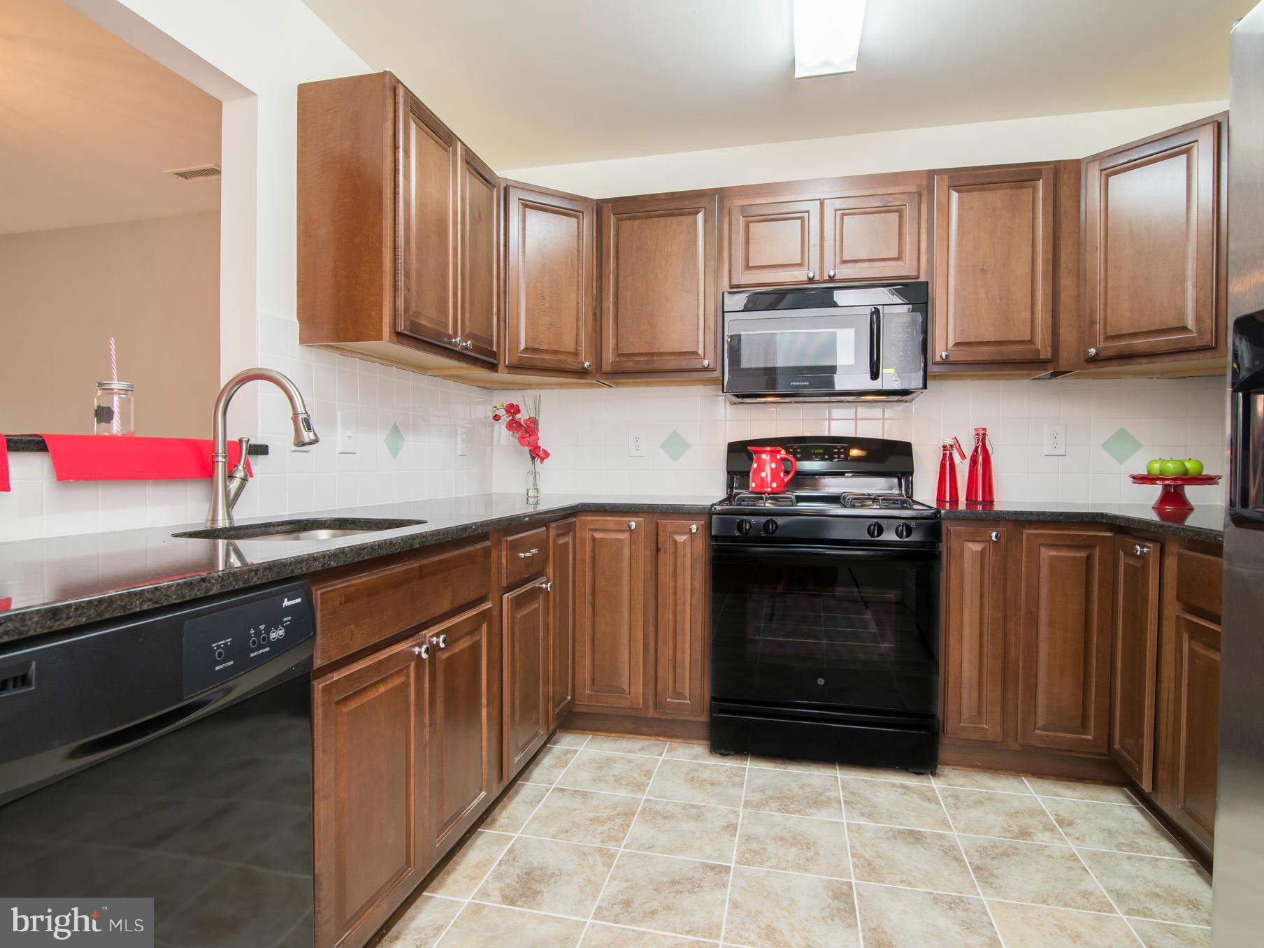 20576 Snowshoe Square, Unit 102 Ashburn, VA 20147 - Photo 2 of 30 New cabinets